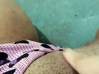 Hey, why is this horny young bitch fingering her wet shaved pussy in that minnie short with such intense moans?