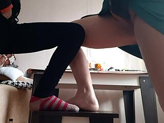 Middle aged woman masturbates with student in jeans and miniskirt