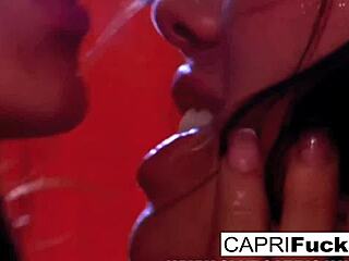 Capri takes on London in hot lesbian action with big tits and intense fucking! 🔥💦