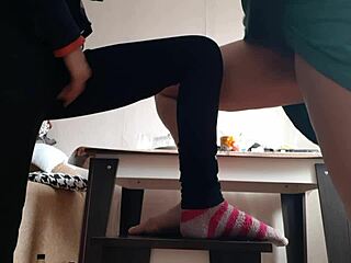 Middle aged woman masturbates with student in jeans and miniskirt