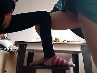 Middle aged woman masturbates with student in jeans and miniskirt