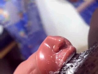 hey, wanna see this huge thick black dick guy cream a throat toy in solo masturbation?