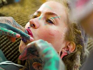 whoa check this tattooed whore in sexy fishnets and highheels doing solo anal play with a huge dildo