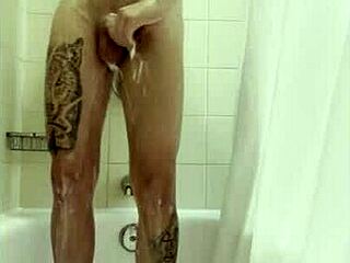 In the bath, she casually touches him, leading to a steamy handjob scene with the pornstar.