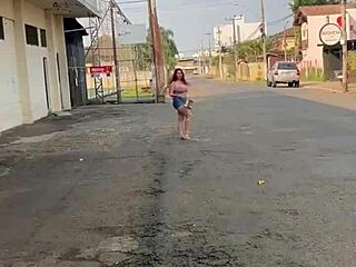 this pretty exhibitionist gives a deepthroat blowjob outdoors on the street. she swallows cum after rough face fucking in public.