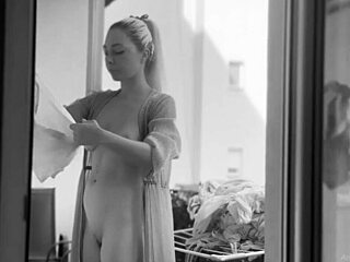 Naked chubby woman casually hangs laundry on balcony while neighbors watch her shaved pussy