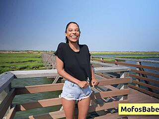 Sexy ebony Eden West teases her horny friend Charles Dera by fingering her wet pussy with those big natural boobs bouncing.