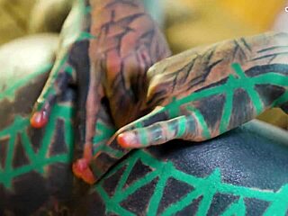 whoa check this tattooed whore in sexy fishnets and highheels doing solo anal play with a huge dildo