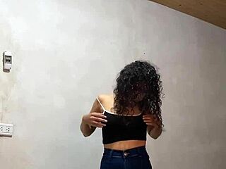 Spy cam catches real busty Colombian university student undressing on study trip