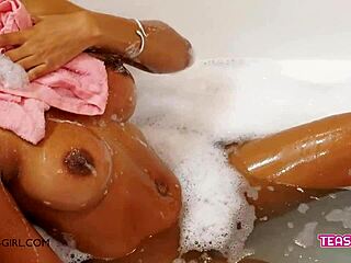 Super hot dark skin model masturbates on sofa