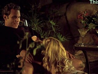 Hey, check out this blonde hottie passionately fucking her man in the garden at evening time