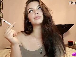 xo bunny brunette latina with blue eyes smoking cigarette blowing smoke in your face