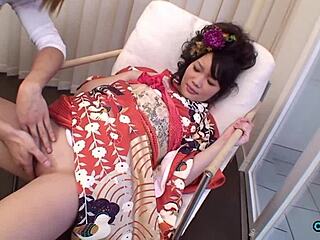 Lovely geisha-looking Asian babe flashes her skirt upskirt and rubs to orgasm in casting