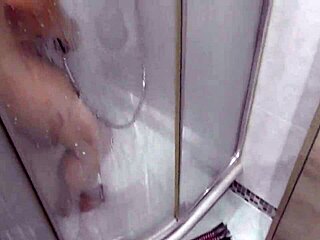 Unexpected View of Busty Stepmom in Shower Leads to Private Moment of Self-Pleasure