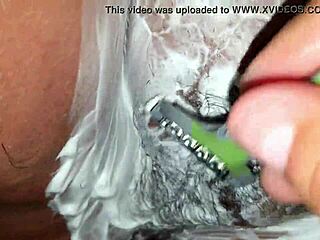 Shaving my fat shaved pussy boldly