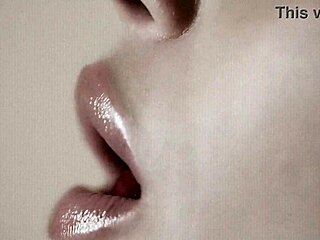 detailed close up exploration of beautiful babe's lips in a simple fetish style presentation without any added elements or actions for pure focus