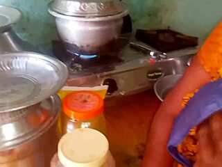 Watch this hot desi bhabhi cooking up steamy homemade action in the kitchen with her roommate!