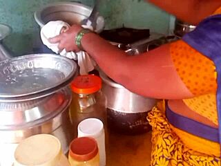 Watch this hot desi bhabhi cooking up steamy homemade action in the kitchen with her roommate!