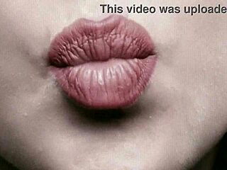 detailed close up exploration of beautiful babe's lips in a simple fetish style presentation without any added elements or actions for pure focus