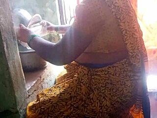 Watch this hot desi bhabhi cooking up steamy homemade action in the kitchen with her roommate!