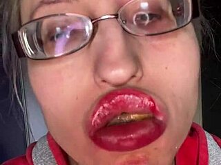 giantess with big lips and eyeglasses contrasts huge tall fetish while eating snickers protein bar