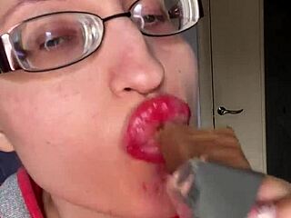 giantess with big lips and eyeglasses contrasts huge tall fetish while eating snickers protein bar