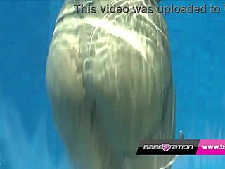 Outdoor pool striptease with brunette babe revealing big tits shaved pussy and wet big ass