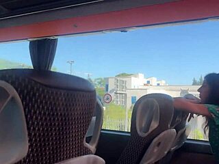 In a crowded public bus, the brunette spots the flashing cock and grabs it for a close-up handjob.