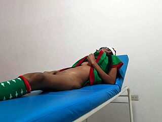 In the massage parlor, dressed as a goblin woman, she rides a dildo while waiting for her boyfriend's arrival.