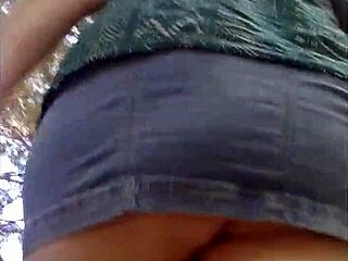 I enjoy how this sexy mature woman just focuses on sucking cock passionately in the quiet forest setting.