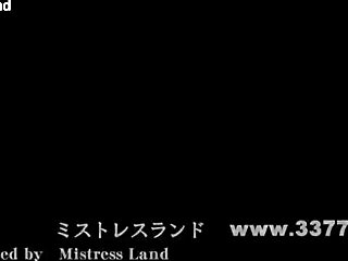 Japanese femdom mistress dominates slave as human sandbag in intense bdsm session