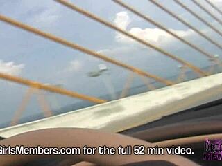 Topless Brunette Flashes Big Tits in Convertible Driving Over Skyway Bridge