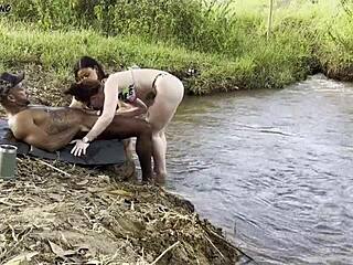 outdoor sunbathing by the river with two hotties sucking and fucking until creampie 😈🌞