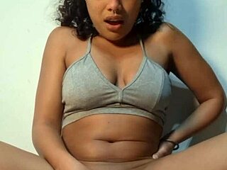 Colombian brunette with big clit masturbates solo using vibrator on tight wet pussy until squirting twice