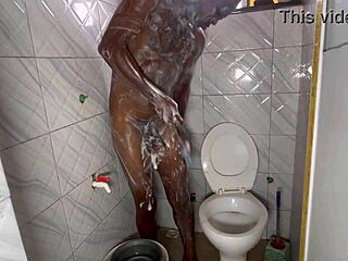 Amateur takes a steamy shower with a massive big black cock for intense pleasure