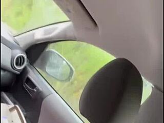 Suggestive Streetwalker in wet t-shirt gives backseat blowjob swallows cum pov