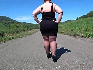 Hey, check out this mature BBW strutting in nylon pantyhose and heels on the public road?