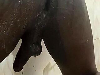 Damn, look at sexyjayla254 jerking off that huge black cock in the steamy shower!