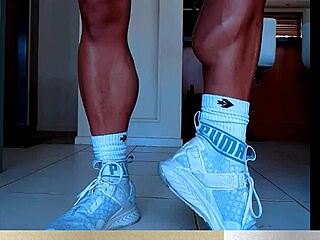 muscular calves on female bodybuilder showcased