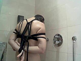 naked babe bound in hotel shower under hidden camera gaze part 3