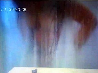 Hidden cam catches german wife fingering to cum in steamy shower
