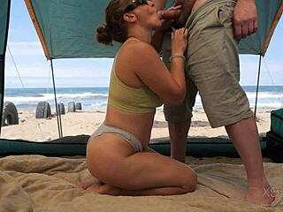 Stranger bends hot babe over for risky beach doggystyle pounding