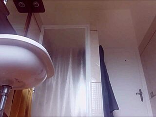 Amateur milf scrubs her big tits in steamy shower