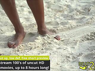 giggles' sandy bare feet tickled on beach