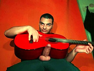 sexy bodybuilder grinds guitar on monster cock